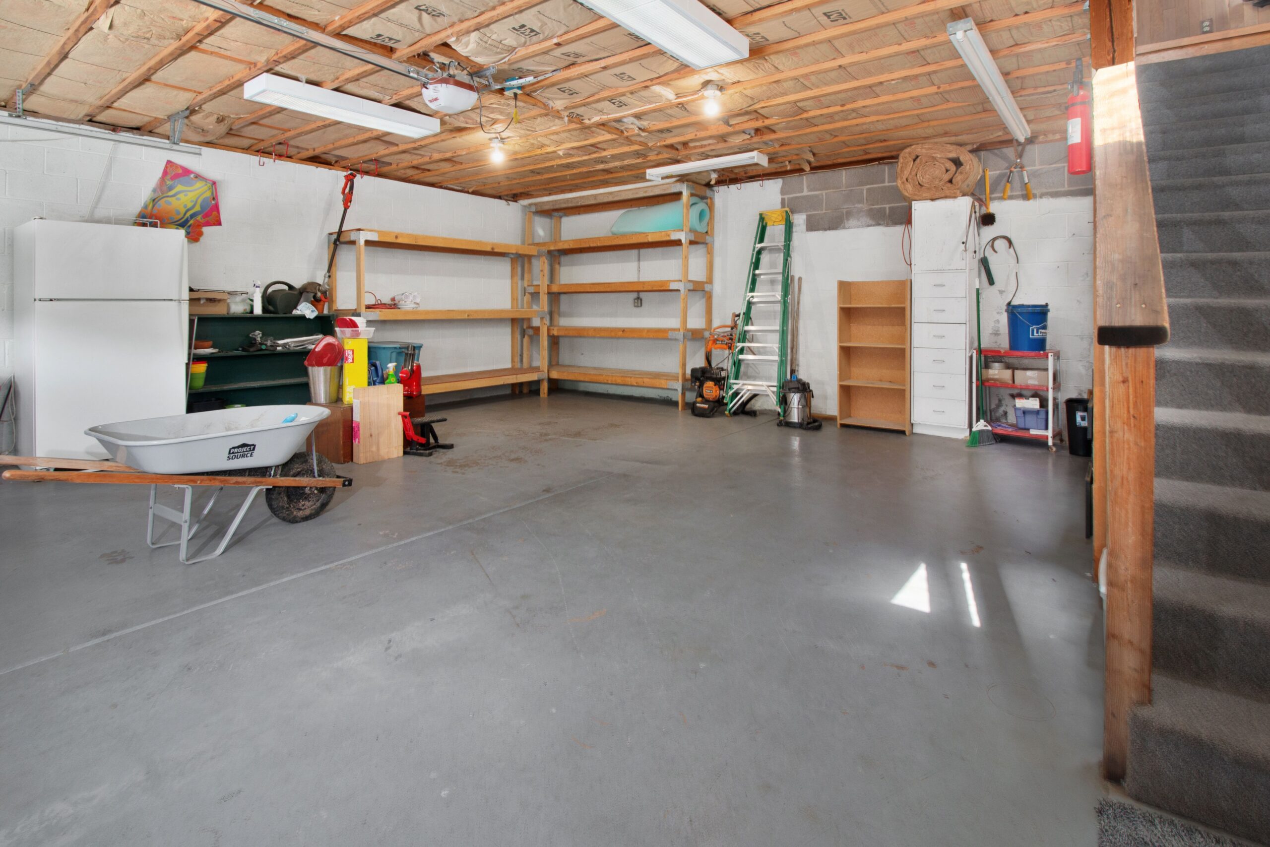 Unfinished concrete garage floor before epoxy coating installation