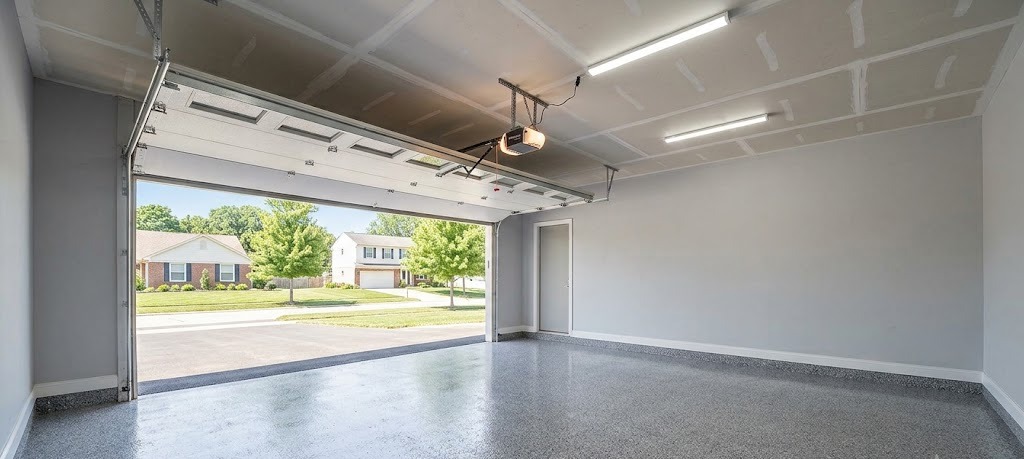Open two-car garage with gray flake epoxy coated floor in Plymouth-Canton, MI